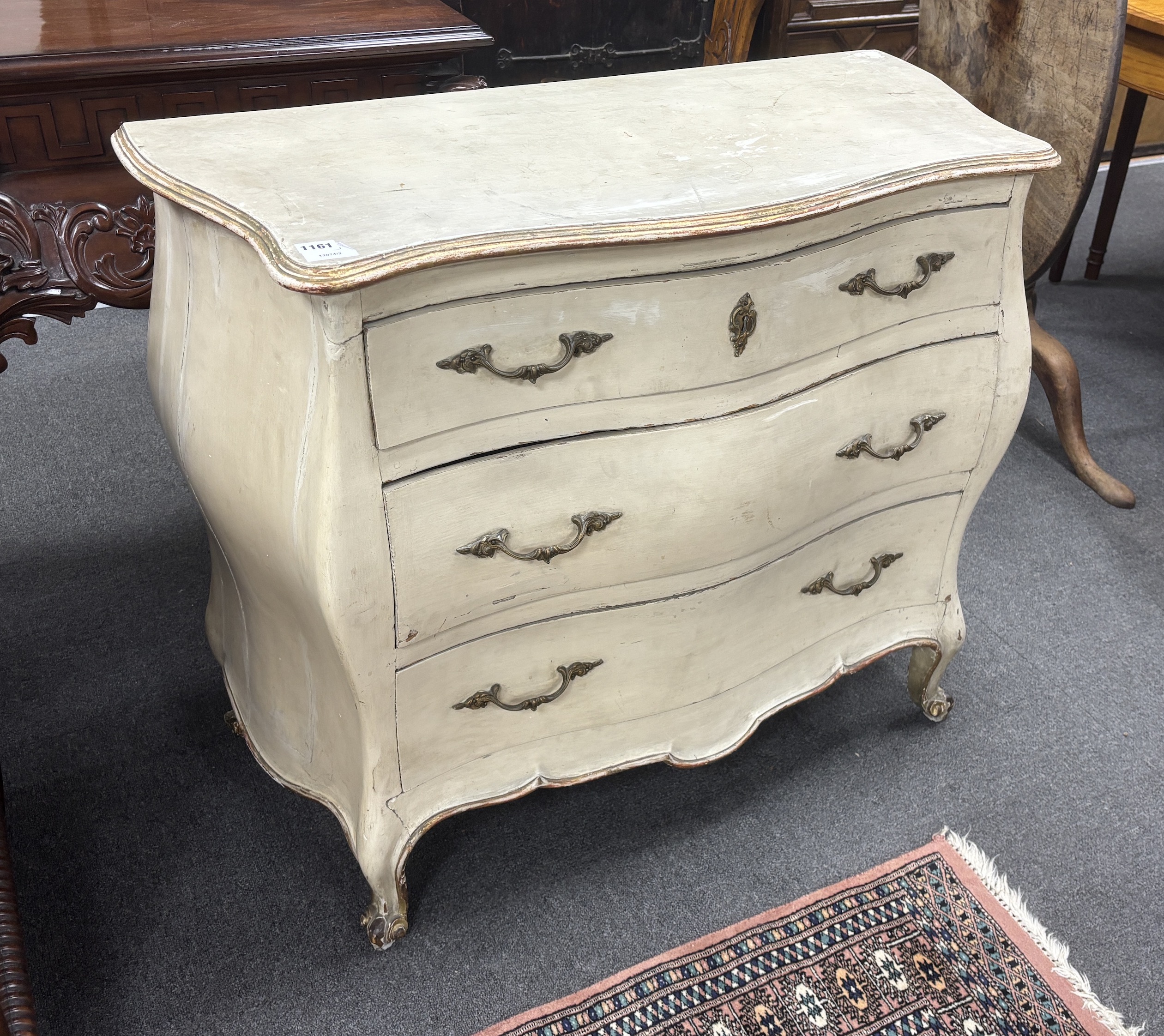 An 18th century style painted pine bombe commode, width 97cm, depth 46cm, height 80cm